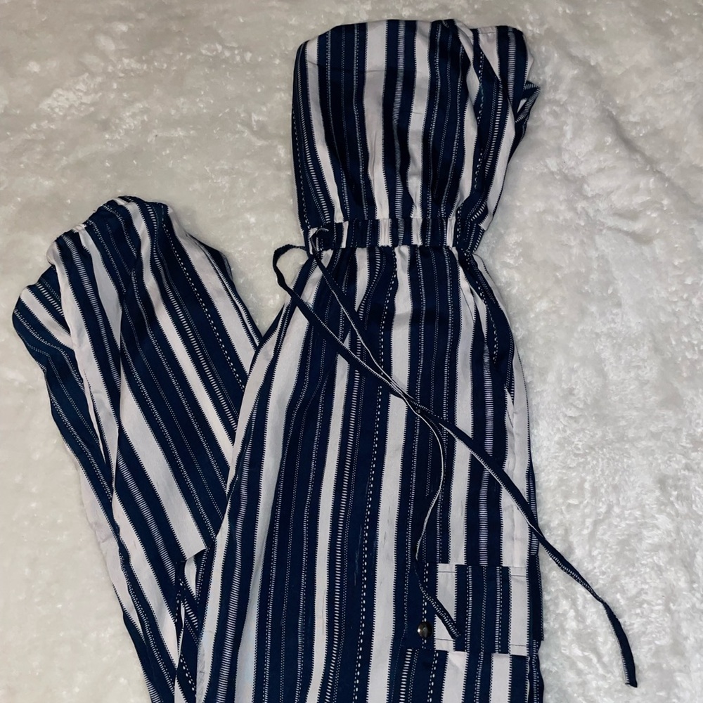 Woman’s clothing , condition like used/new sizes Medium and jeans 8,9,30